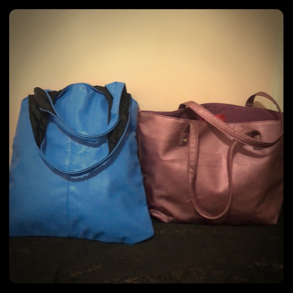 2 New bags 1 is a blue aqua other is mauve pink.